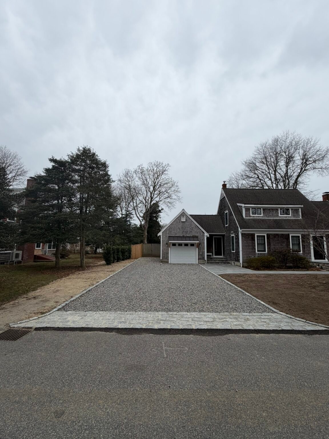 Shell and stone driveway built by Bridi Masonry in Cape Cod, MA