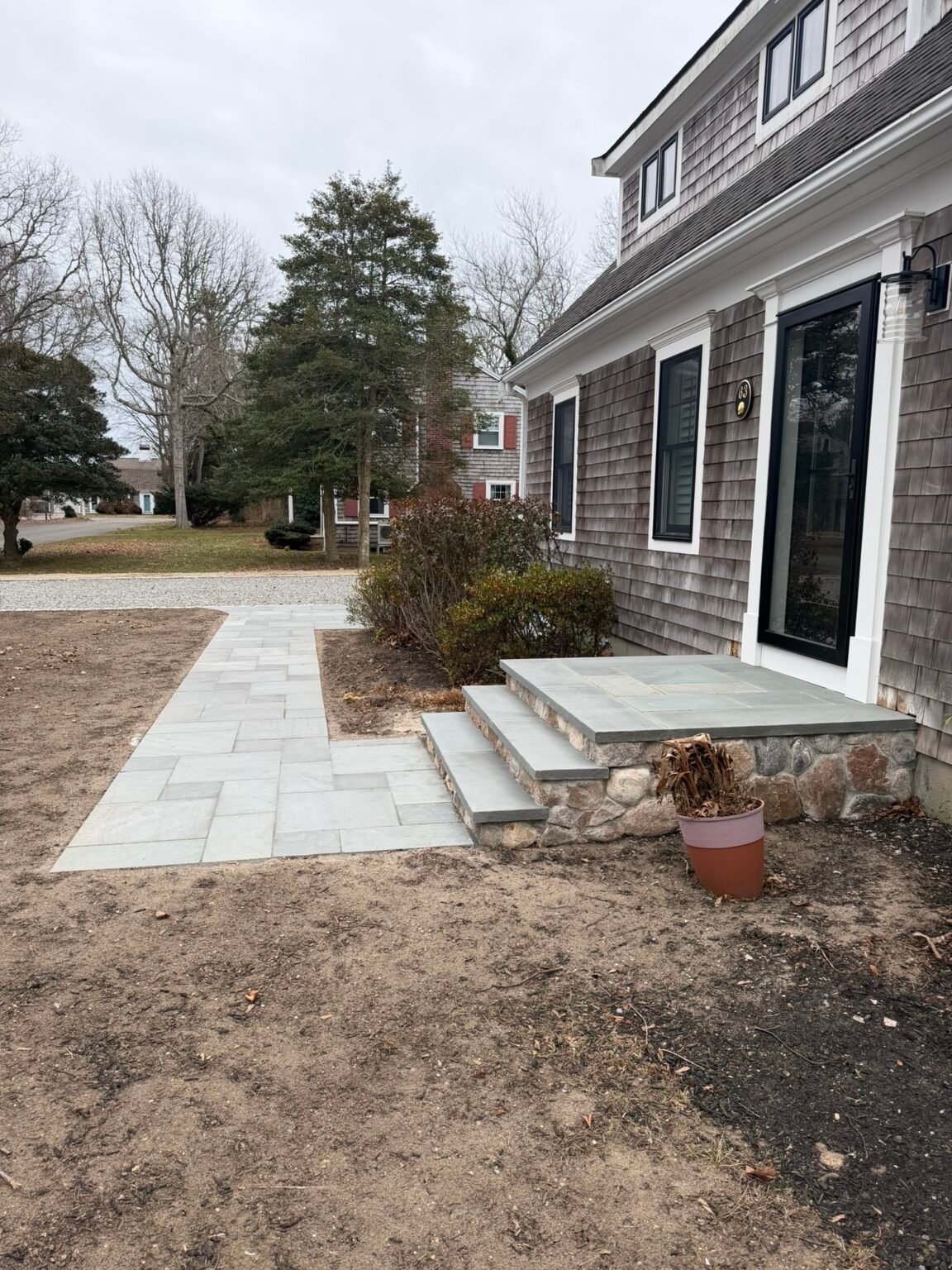 Bluestone patio and steps built by Bridi Masonry in Cape Cod, MA