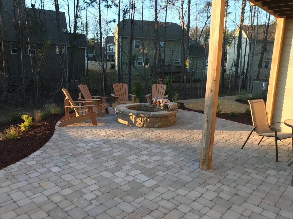 Paver patio with fire pit built by Bridi Masonry in Cape Cod, MA