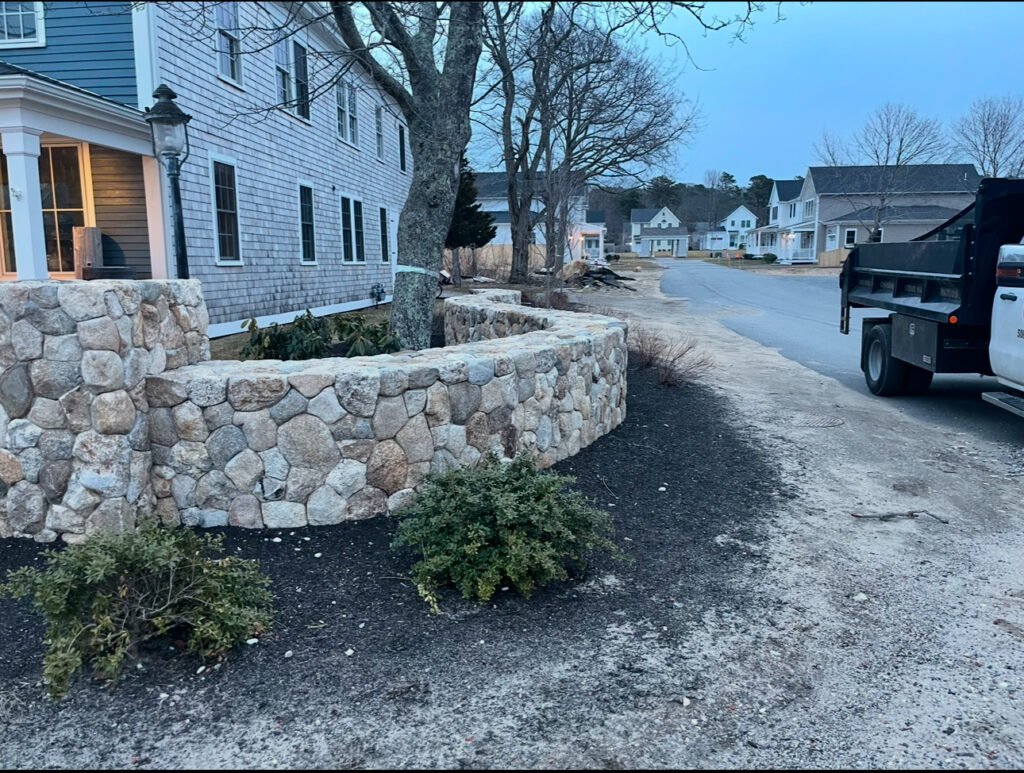 Fieldstone retaining wall built by Bridi Masonry in Cape Cod, MA