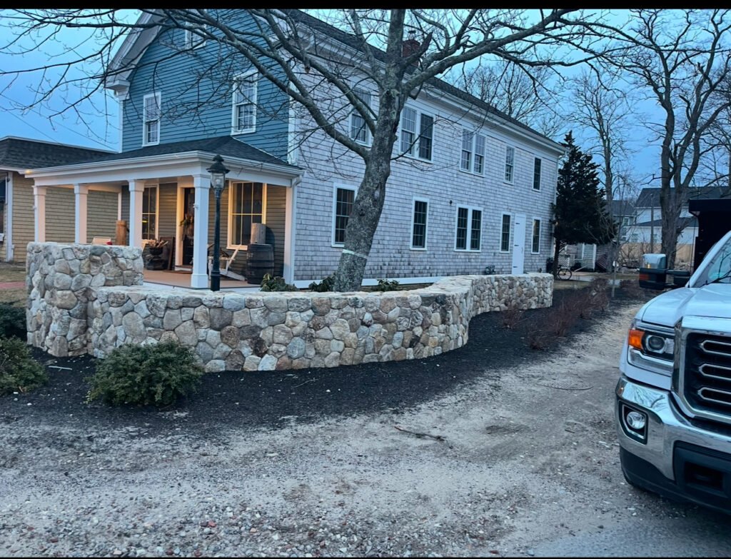 Fieldstone retaining wall built by Bridi Masonry in Cape Cod, MA
