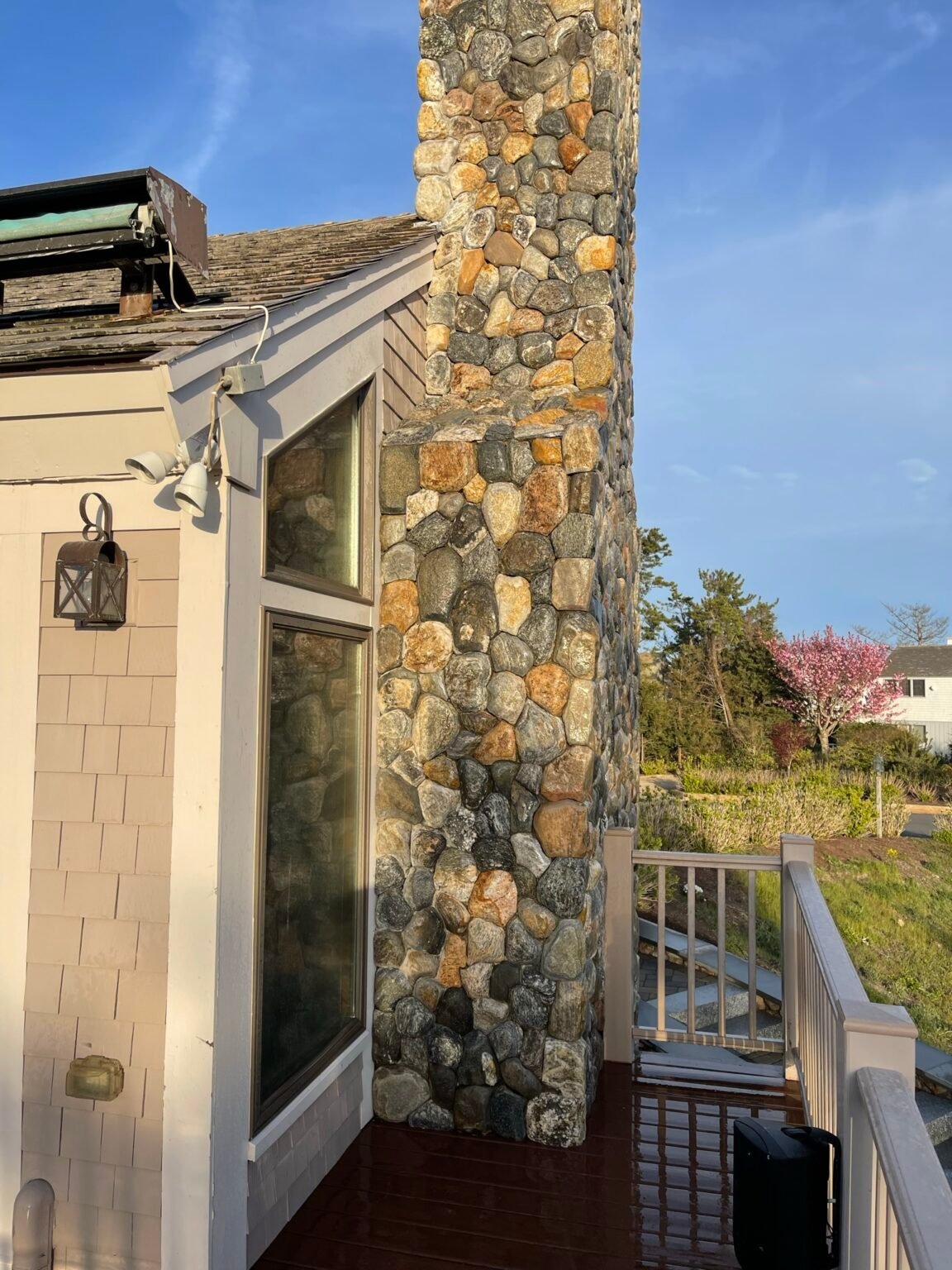 Fieldstone veneer chimney built by Bridi Masonry in Cape Cod, MA