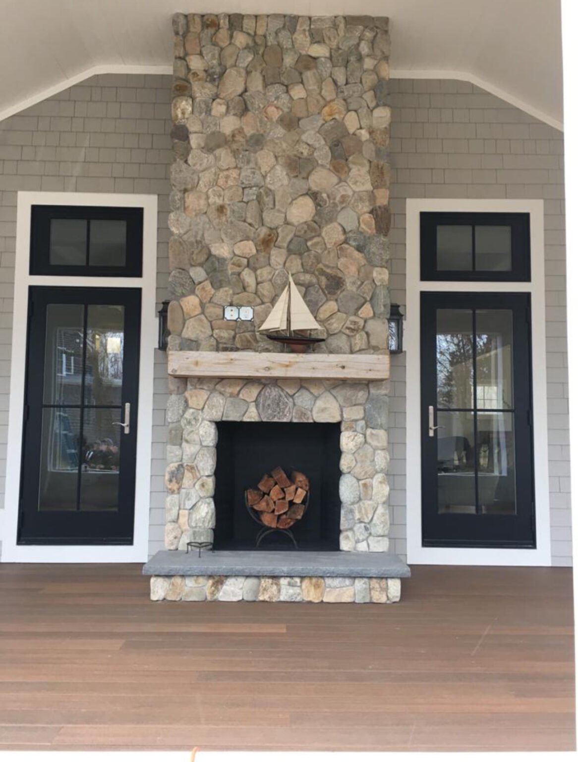 Fieldstone fireplace built by Bridi Masonry in Cape Cod, MA