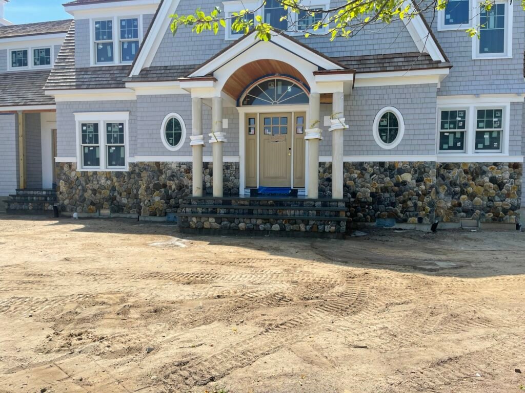 Stone veneer facade and columns built by Bridi Masonry in Cape Cod, MA