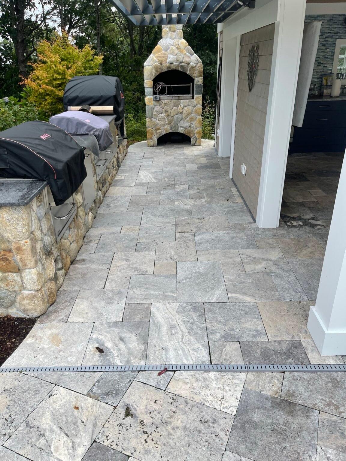 Travertine walkway built by Bridi Masonry in Cape Cod, MA