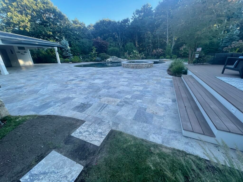 Travertine patio built by Bridi Masonry in Cape Cod, MA