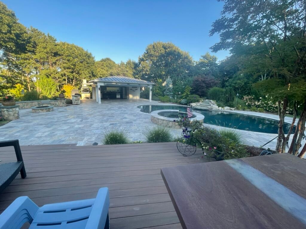Pool deck and patio built by Bridi Masonry in Cape Cod, MA