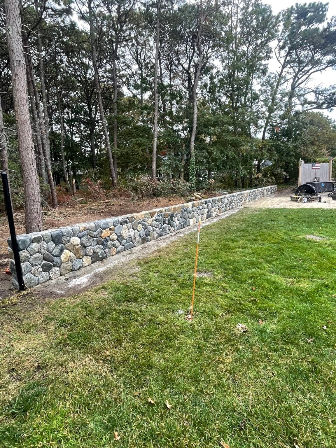 Fieldstone retaining wall built by Bridi Masonry in Cape Cod, MA