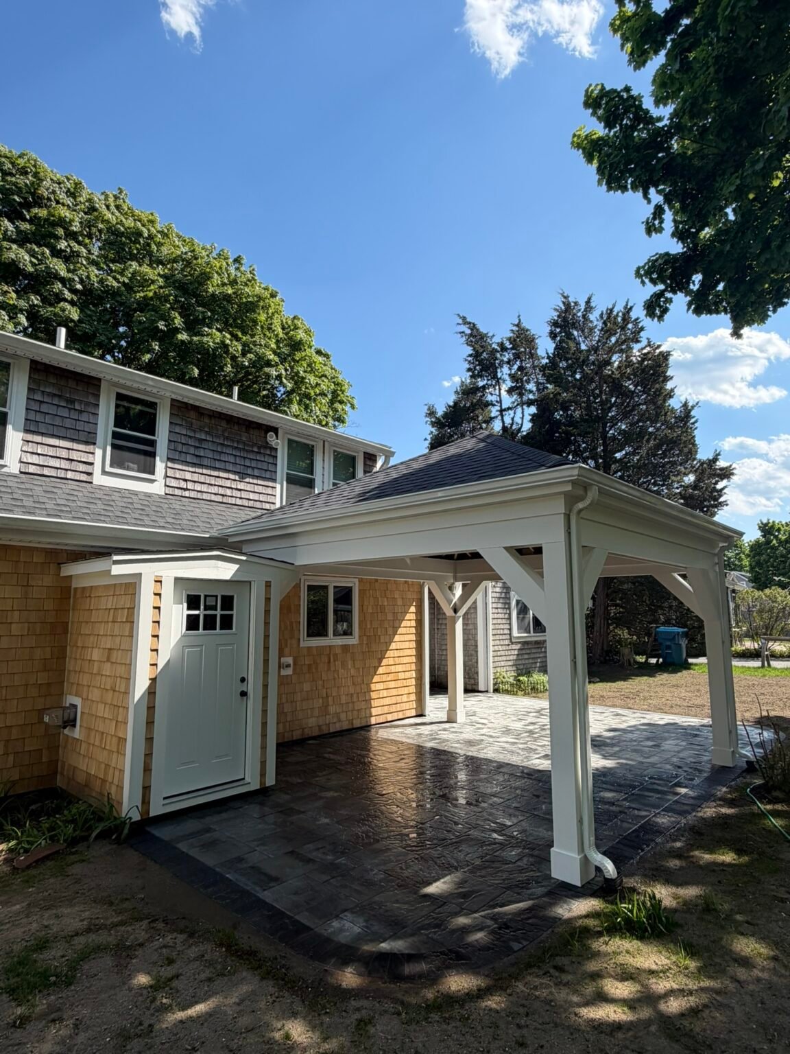 Paver patio with pavilion built by Bridi Masonry in Cape Cod, MA