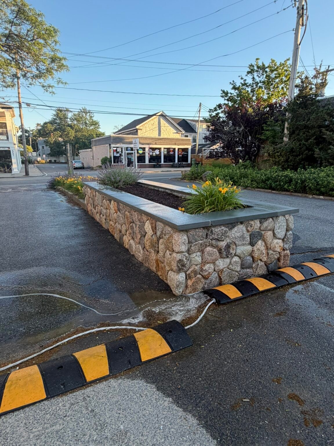 Stone planter wall built by Bridi Masonry in Cape Cod, MA