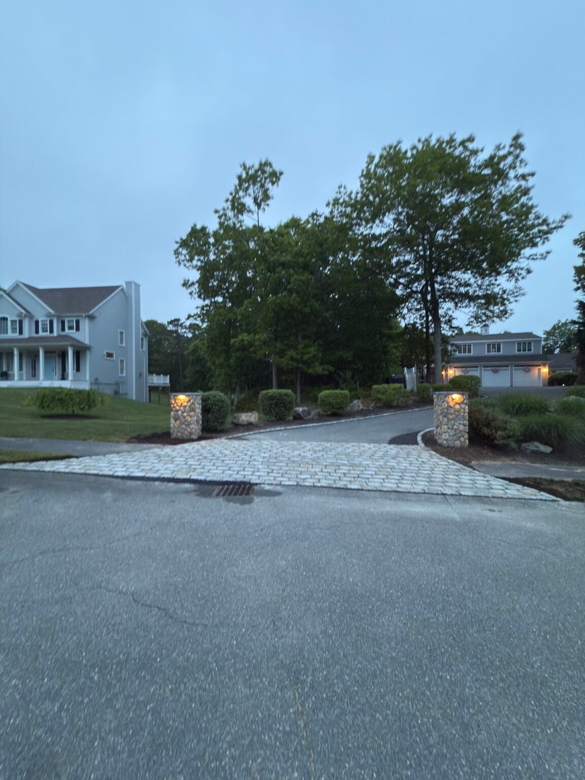 Cobblestone driveway apron built by Bridi Masonry in Cape Cod, MA