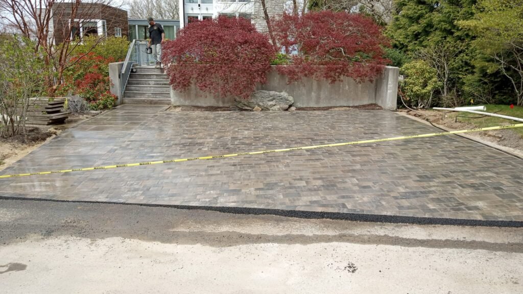 Cobblestone driveway apron built by Bridi Masonry in Cape Cod, MA