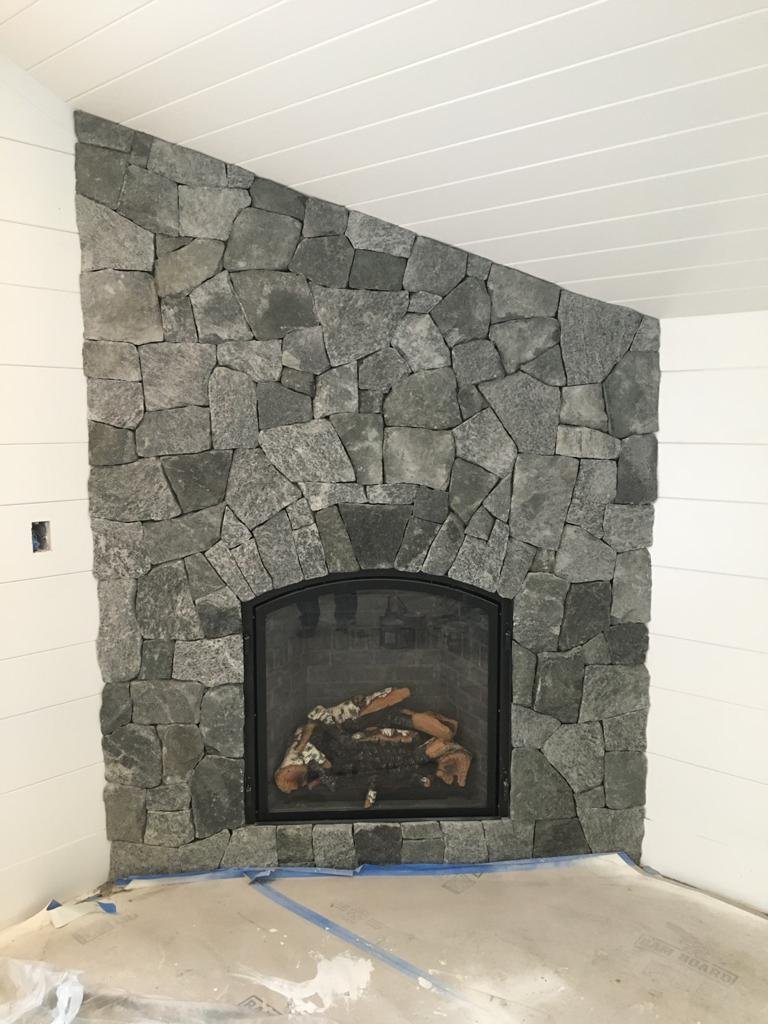 Stone fireplace built by Bridi Masonry in Cape Cod, MA